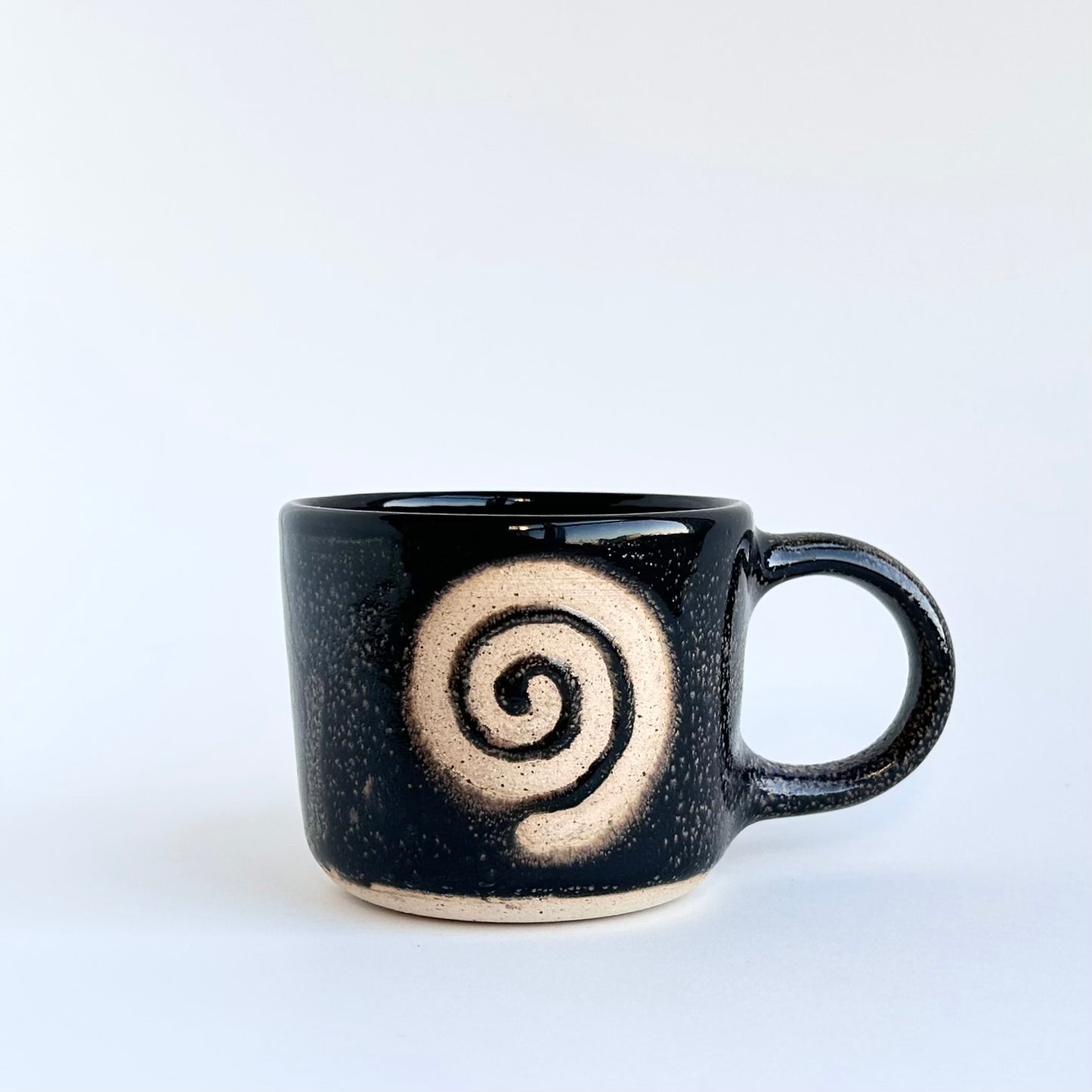 black spiral mug