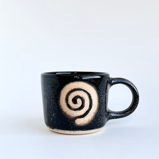 black spiral mug