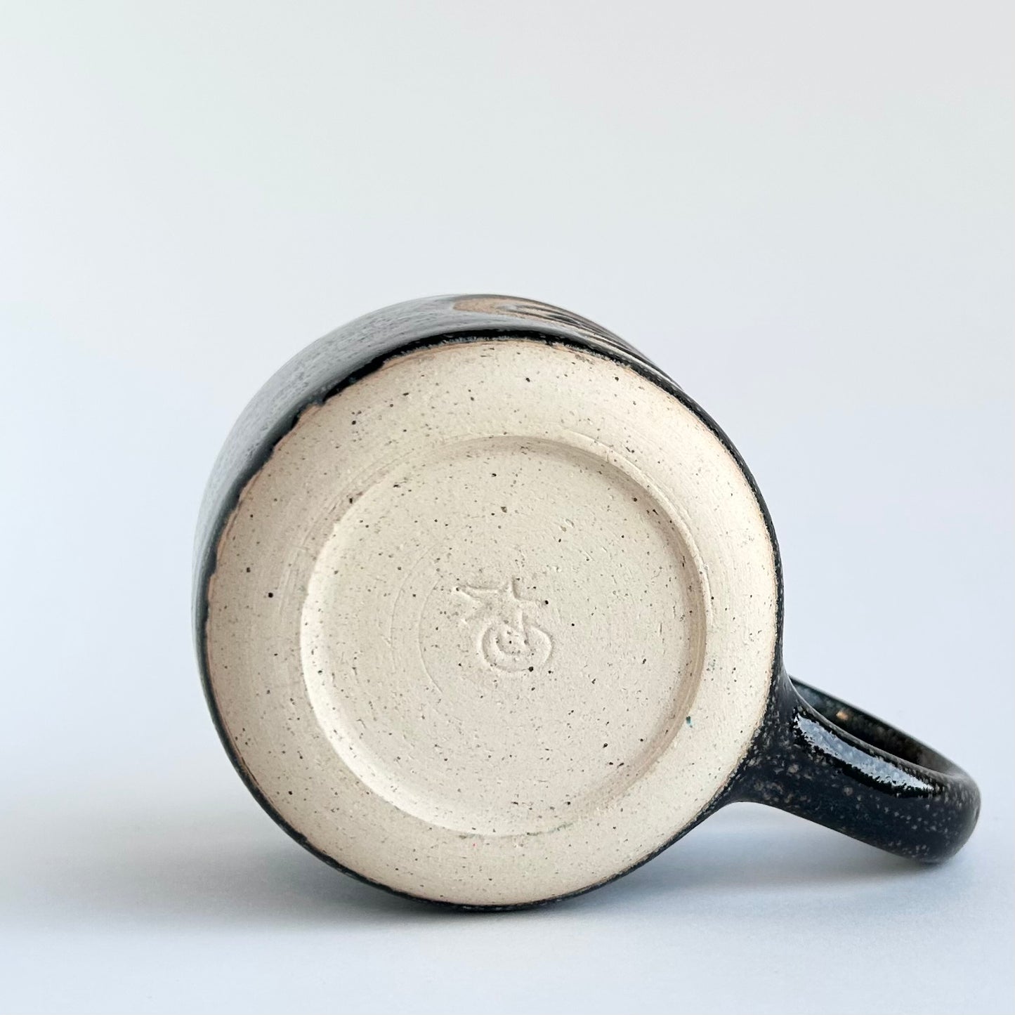 black spiral mug