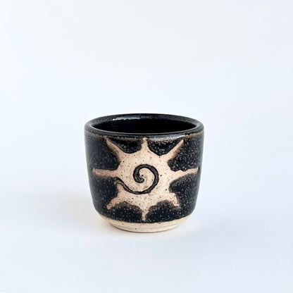 black sun spiral shot glass